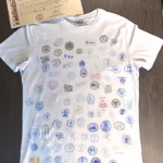 Camino de Santiago Collectible T-Shirt – Authentic Stamps Norte + Primitivo – Unique Wall Display Piece